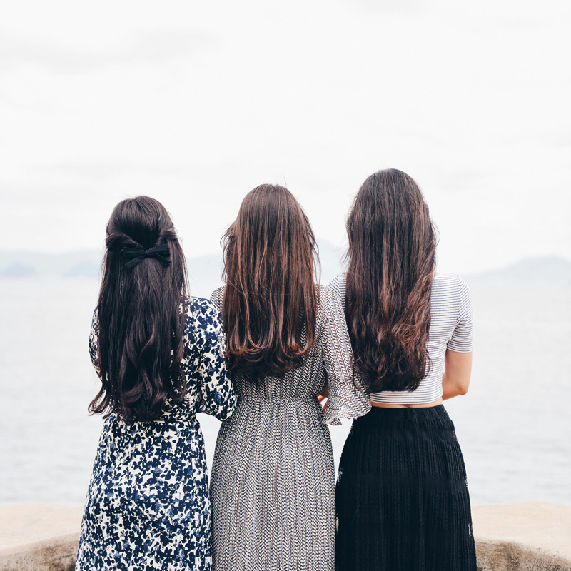 three ladies standing